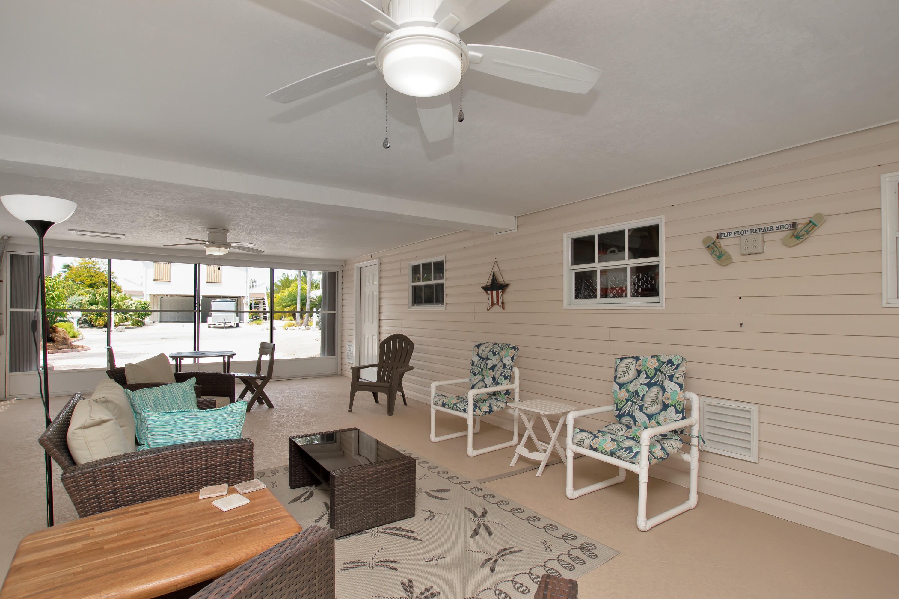 28564 Captain Kidd Road Summerland Key, FL 33042 - Photo 48 of 55 Downstairs screened sitting area 1