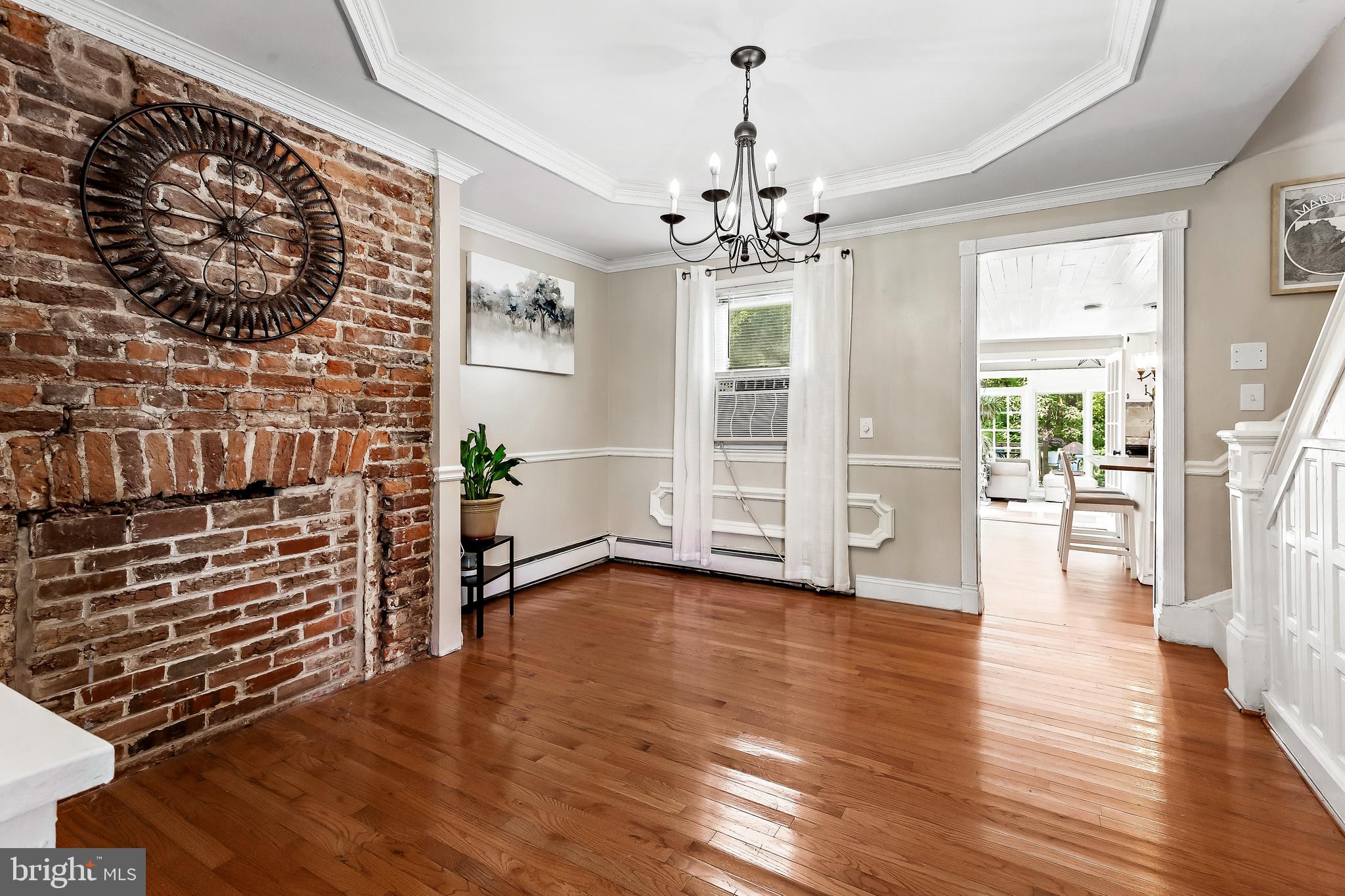 11914 Jericho Road Kingsville, MD 21087 - Photo 18 of 71 a view of an empty room with wooden floor and a window