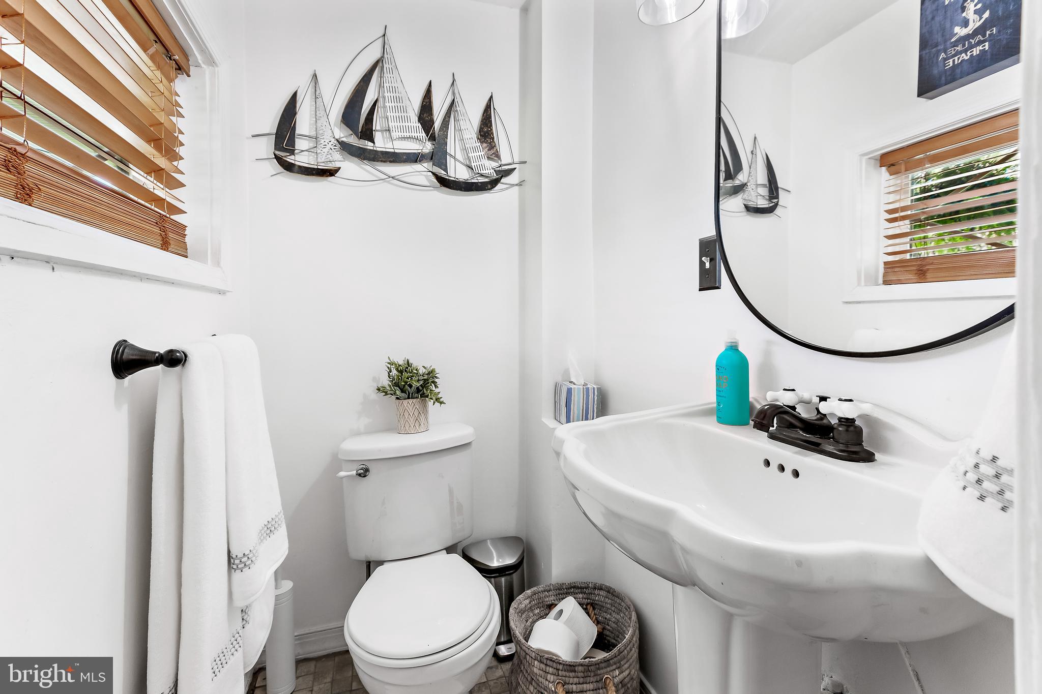11914 Jericho Road Kingsville, MD 21087 - Photo 25 of 71 a bathroom with a sink a toilet and a mirror