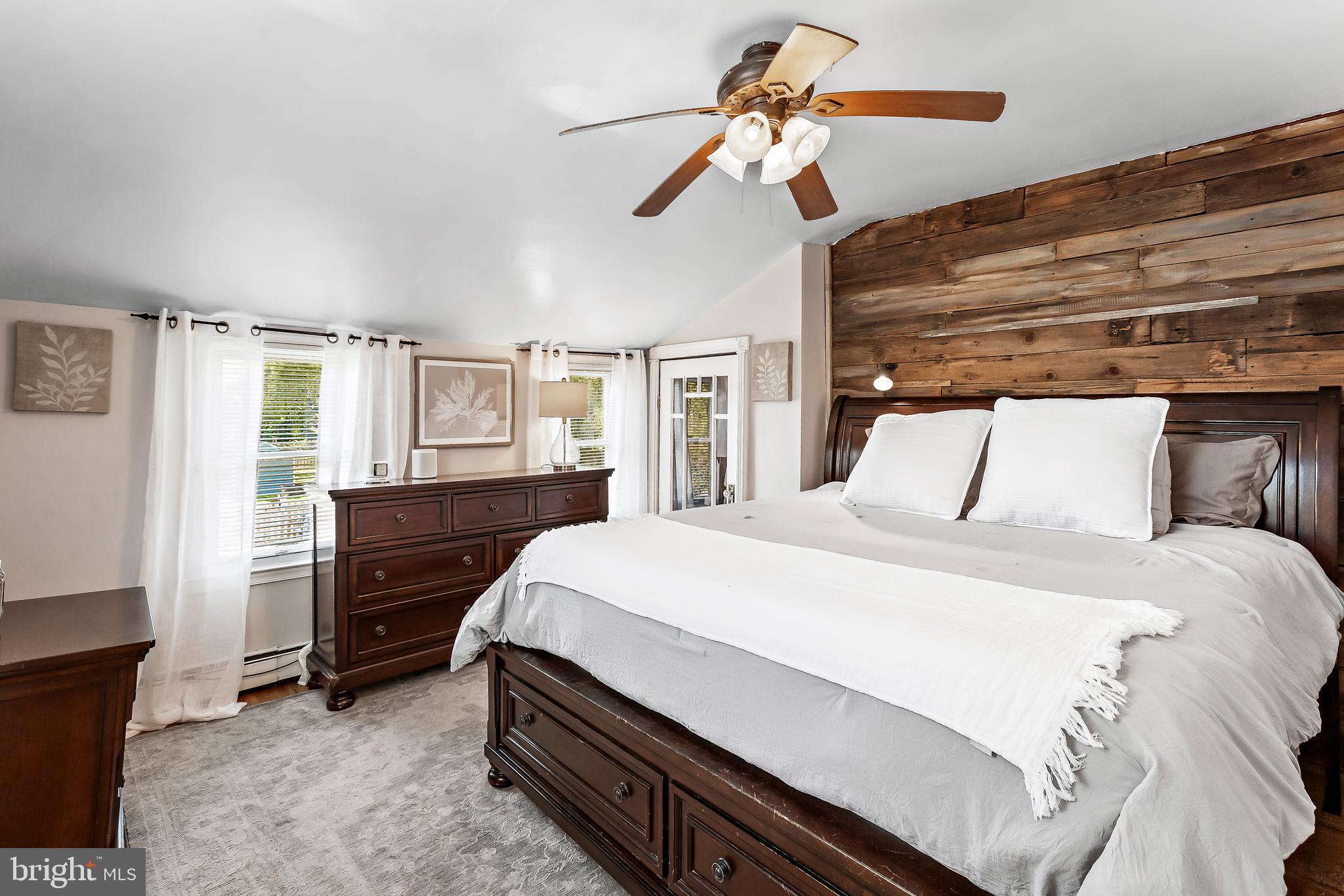 11914 Jericho Road Kingsville, MD 21087 - Photo 26 of 71 a bedroom with a bed and a chandelier