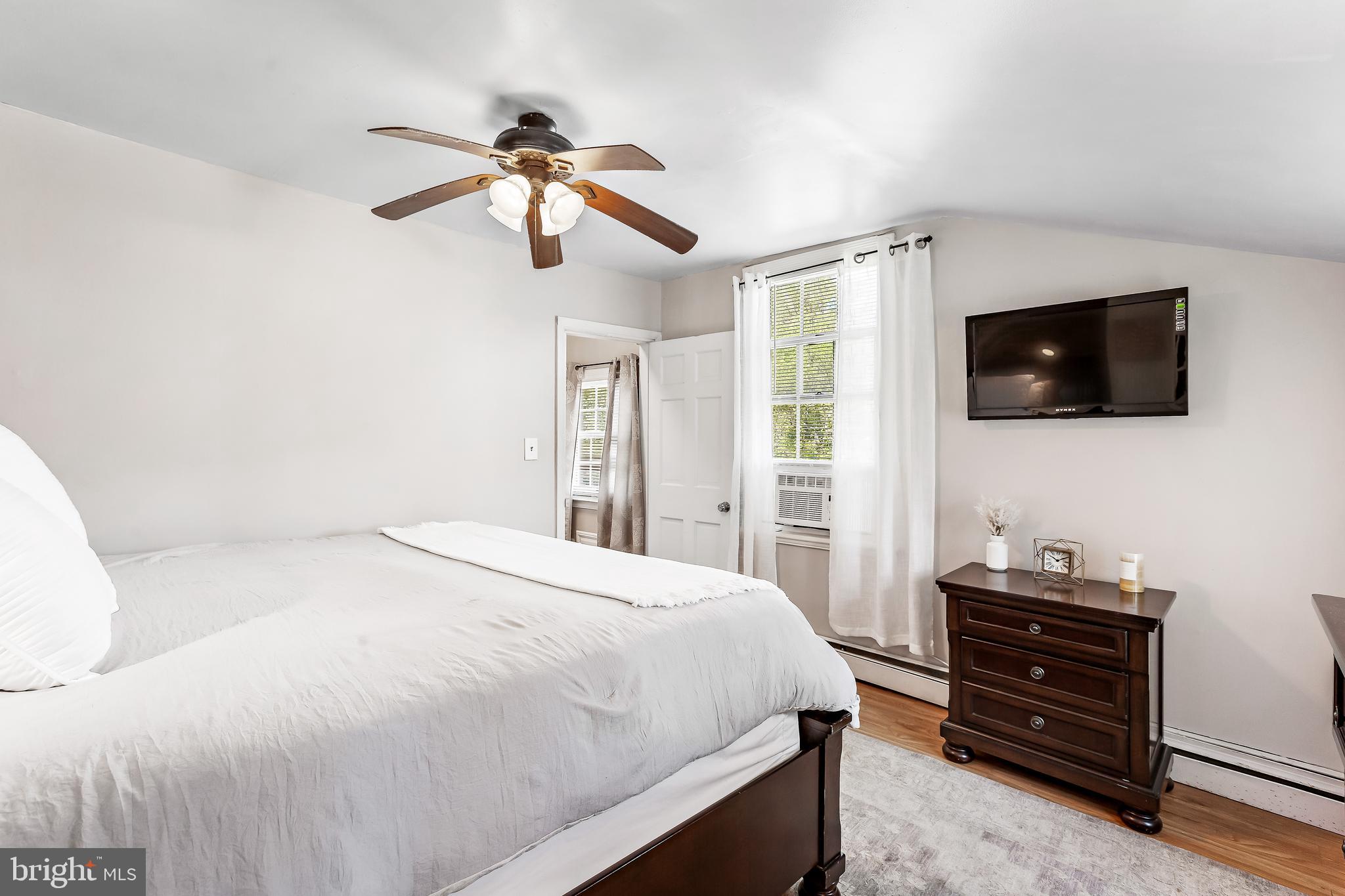 11914 Jericho Road Kingsville, MD 21087 - Photo 28 of 71 a bedroom with a bed and a flat screen tv