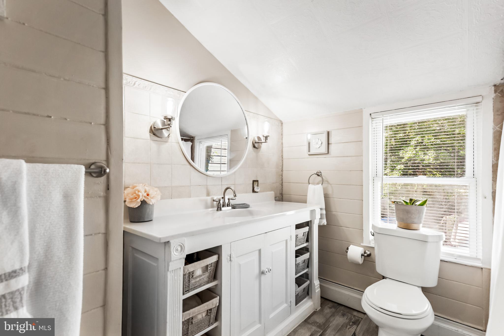 11914 Jericho Road Kingsville, MD 21087 - Photo 30 of 71 a bathroom with a toilet a sink and a mirror