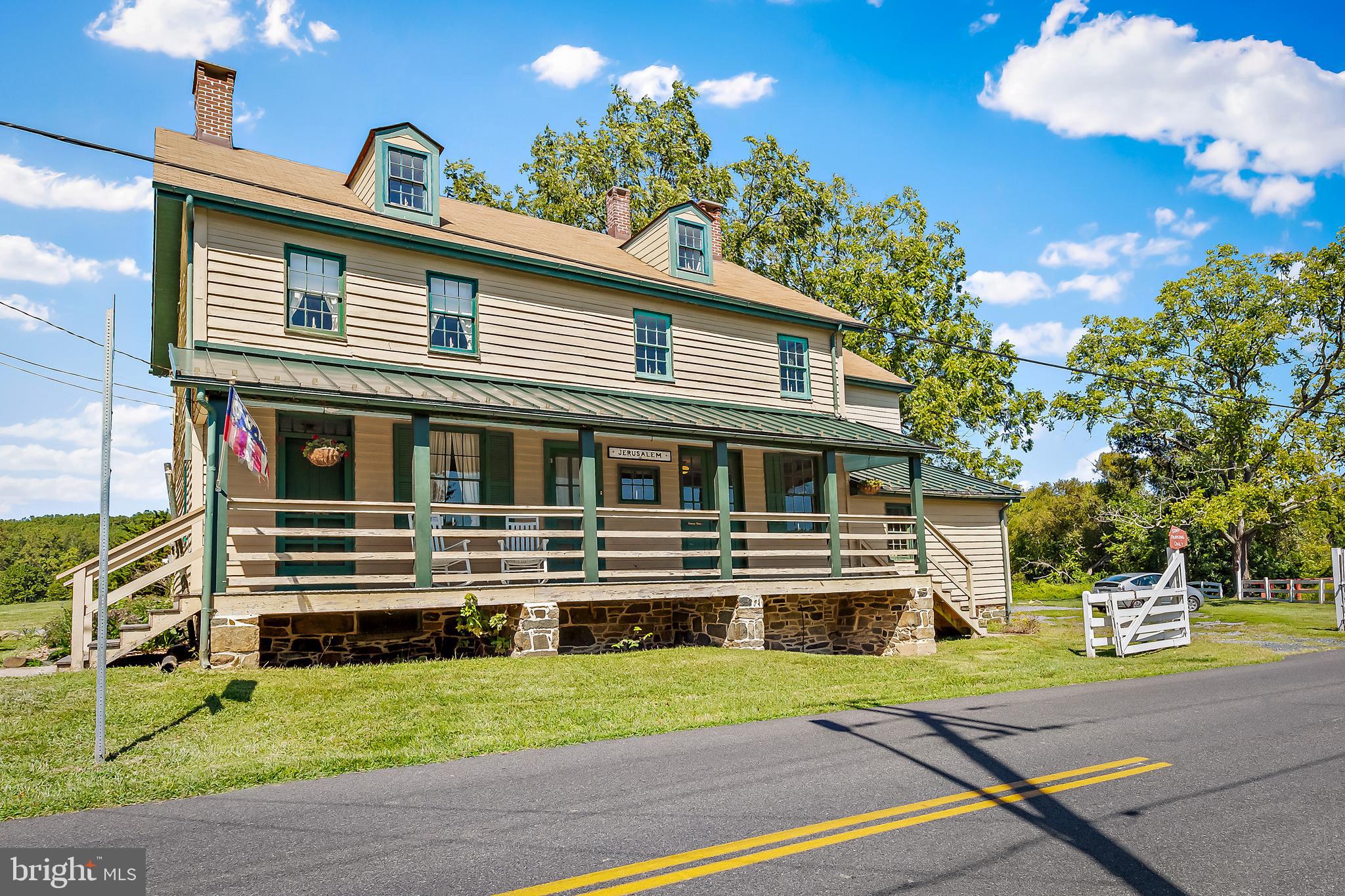 11914 Jericho Road Kingsville, MD 21087 - Photo 48 of 71 a front view of a house with a garden