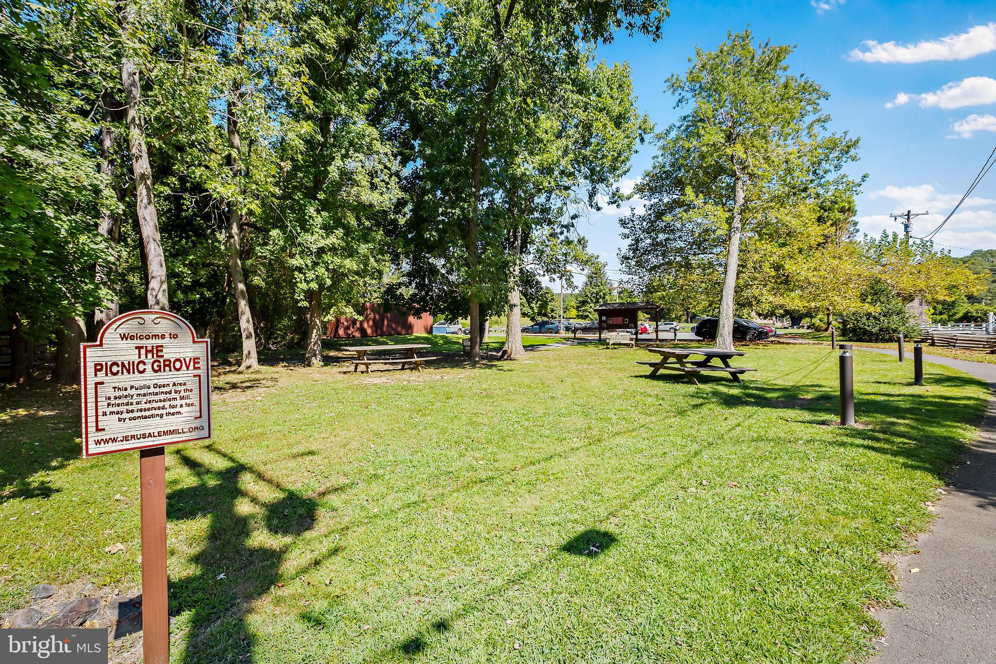 11914 Jericho Road Kingsville, MD 21087 - Photo 53 of 71 a view of a park with swings and a bench