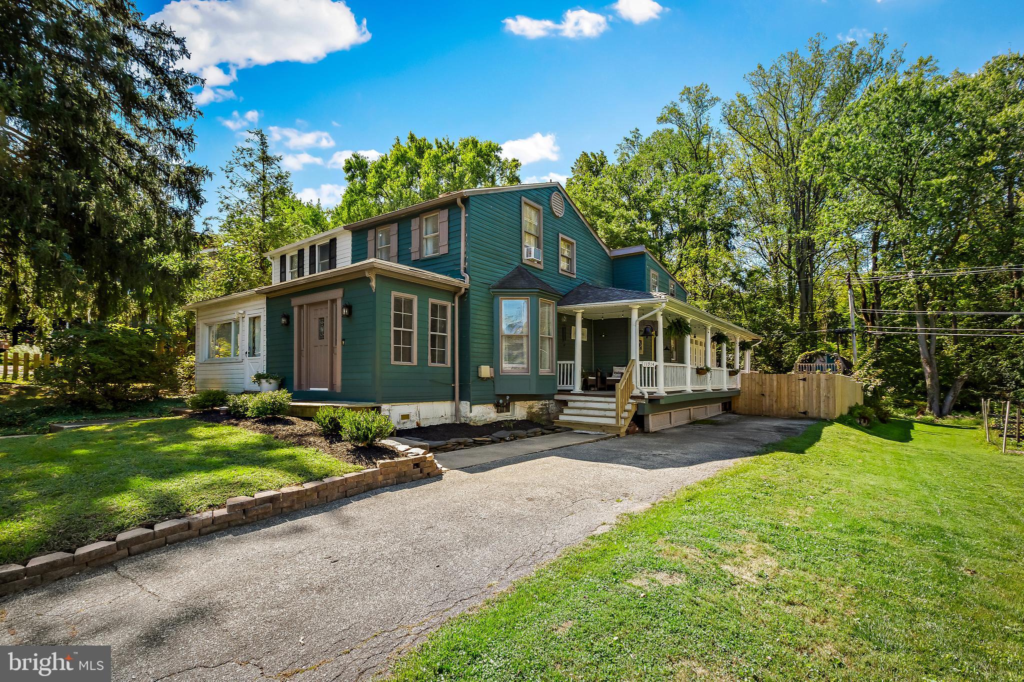 11914 Jericho Road Kingsville, MD 21087 - Photo 7 of 71 a view of a house with backyard sitting area and garden