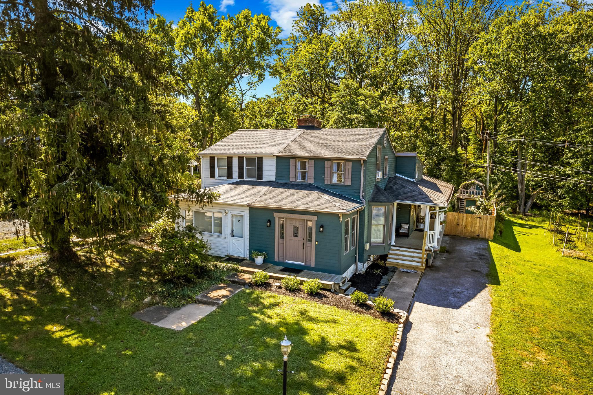 11914 Jericho Road Kingsville, MD 21087 - Photo 8 of 71 a front view of a house with a yard