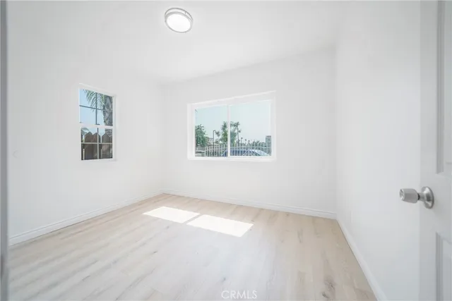 an empty room with a bathroom