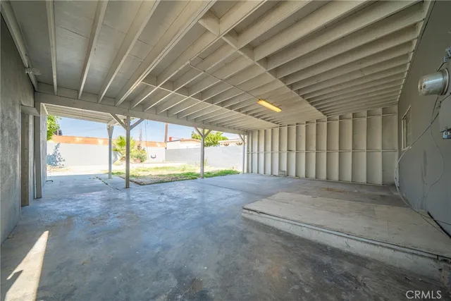 a view of a backyard of the house