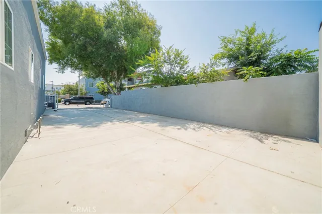 a view of a house with a yard and garage