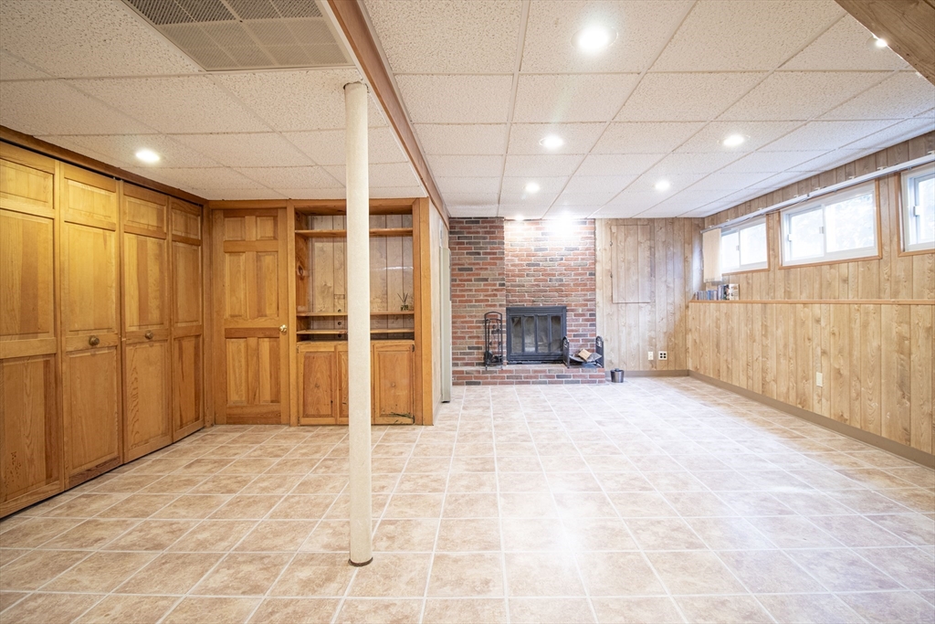 12 Johnson Road Sharon, MA 02067 - Photo 13 of 14 a view of an empty room with a fireplace