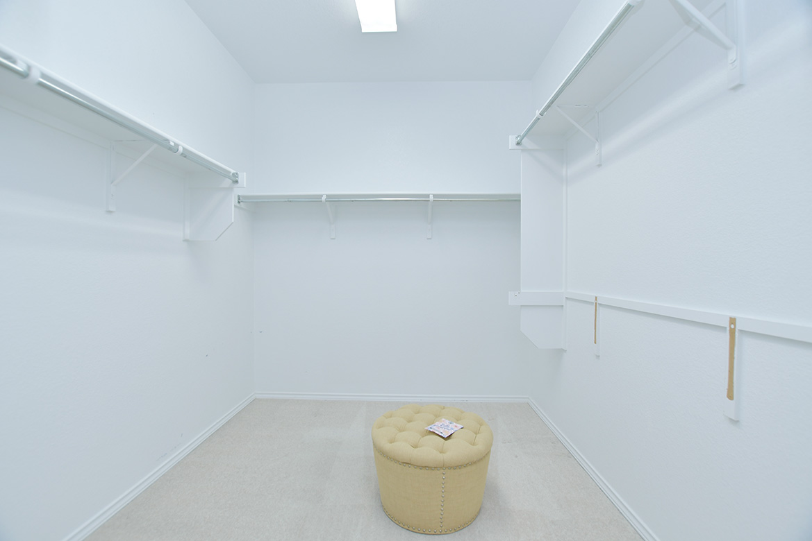 203 Winter Drive Georgetown, TX 78633 - Photo 16 of 29 A generous walk-in closet is found in the primary bedroom.
