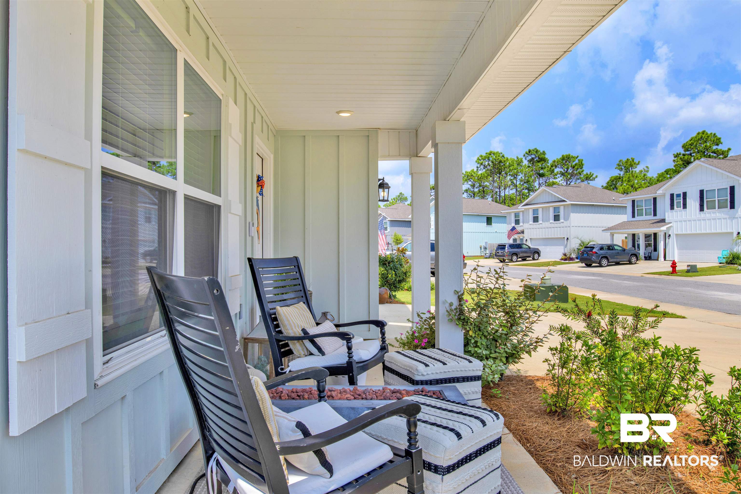 24532 Broken Sound Loop Orange Beach, AL 36561 - Photo 4 of 29 covered porch and a garage