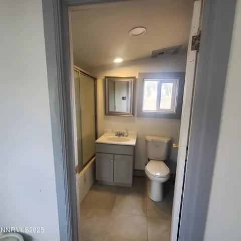 a bathroom with a sink and toilet