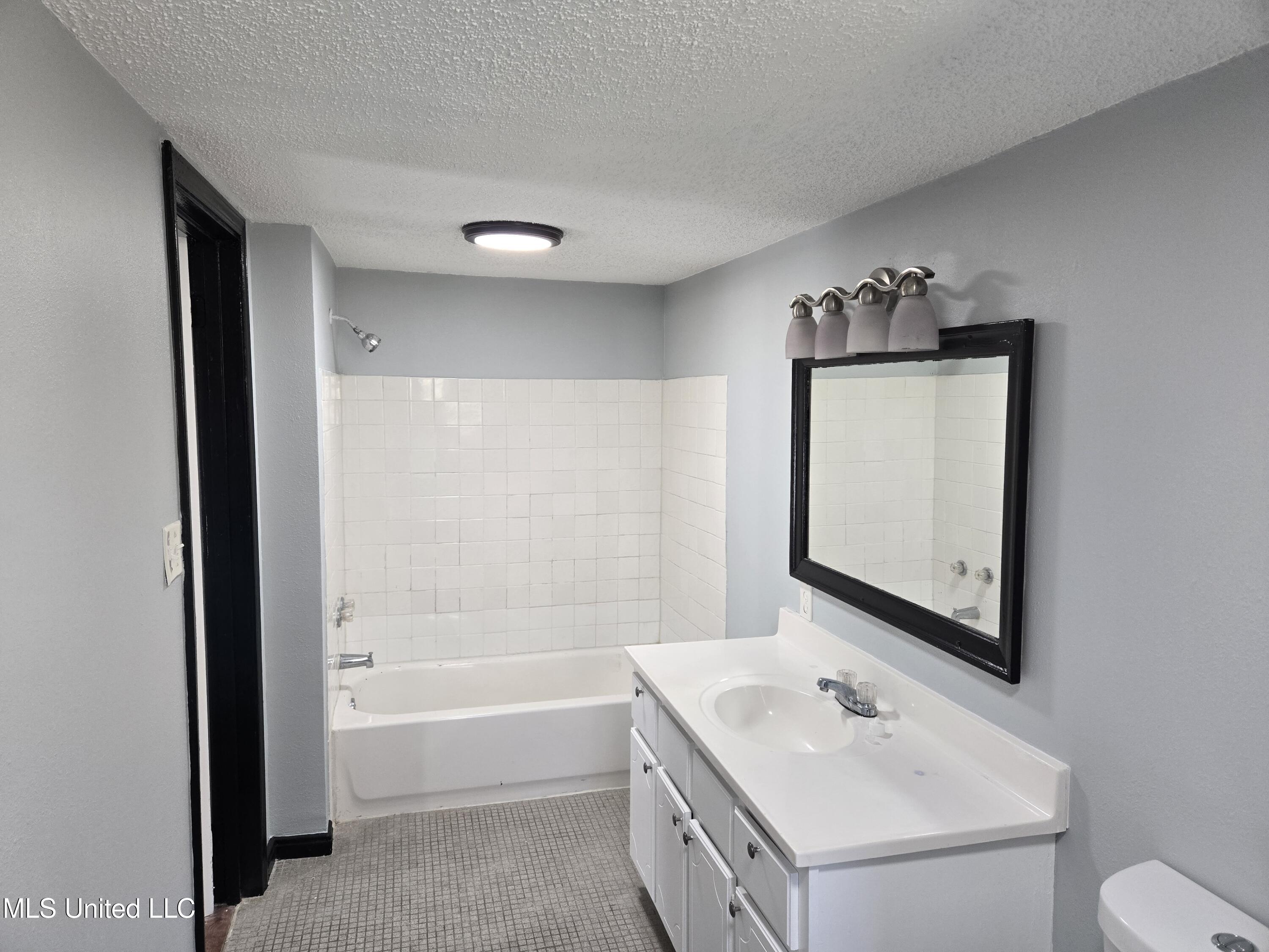 1704 Adcox Road Picayune, MS 39466 - Photo 14 of 19 Upstairs Bathroom