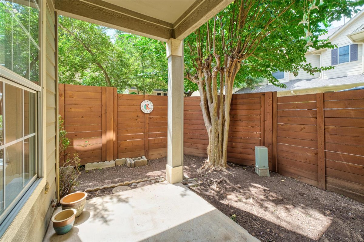 11000 Anderson Mill Road, Unit 11 Austin, TX 78750 - Photo 23 of 34 A private, covered patio area offers a tranquil outdoor retreat.