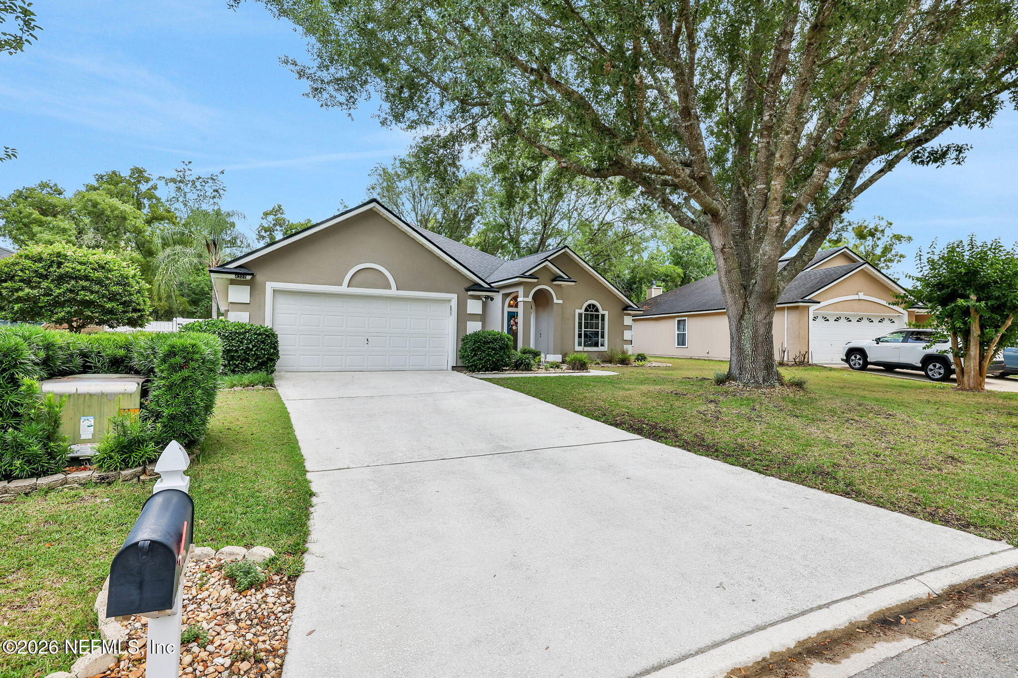 4320 Rye Court St. Johns, FL 32259 - Photo 5 of 60 a front view of a house with a yard and garage