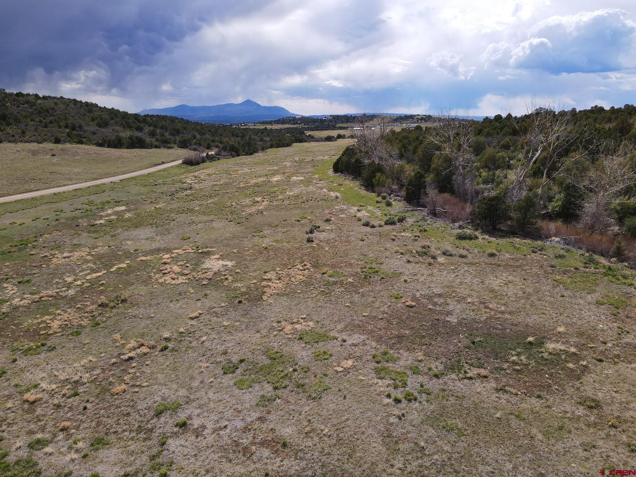 34495 Rd P.2 Mancos, CO 81328 - Photo 19 of 42 a view of a lake with mountains in the background