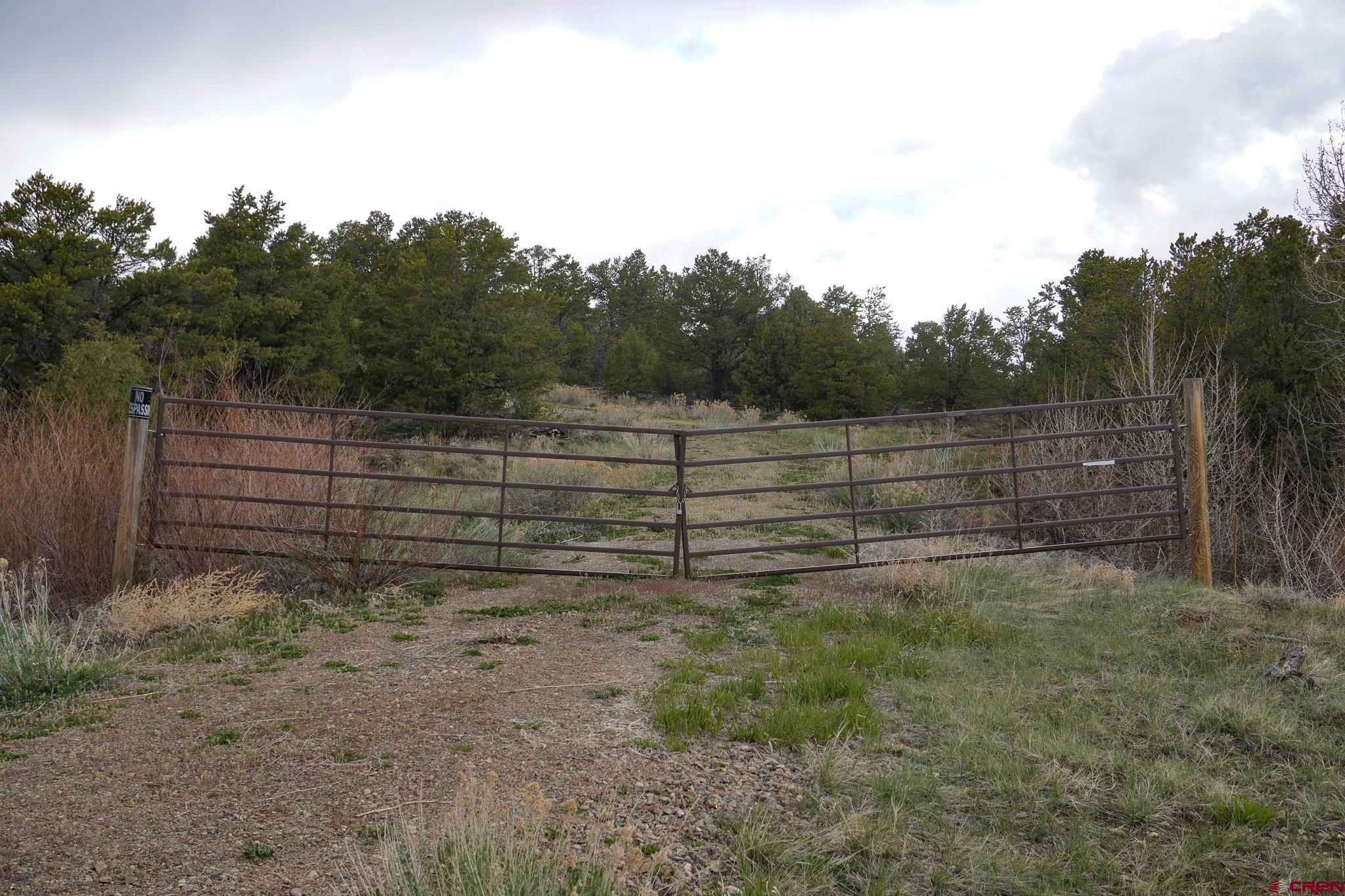 34495 Rd P.2 Mancos, CO 81328 - Photo 26 of 42 a view of a yard with wooden fence