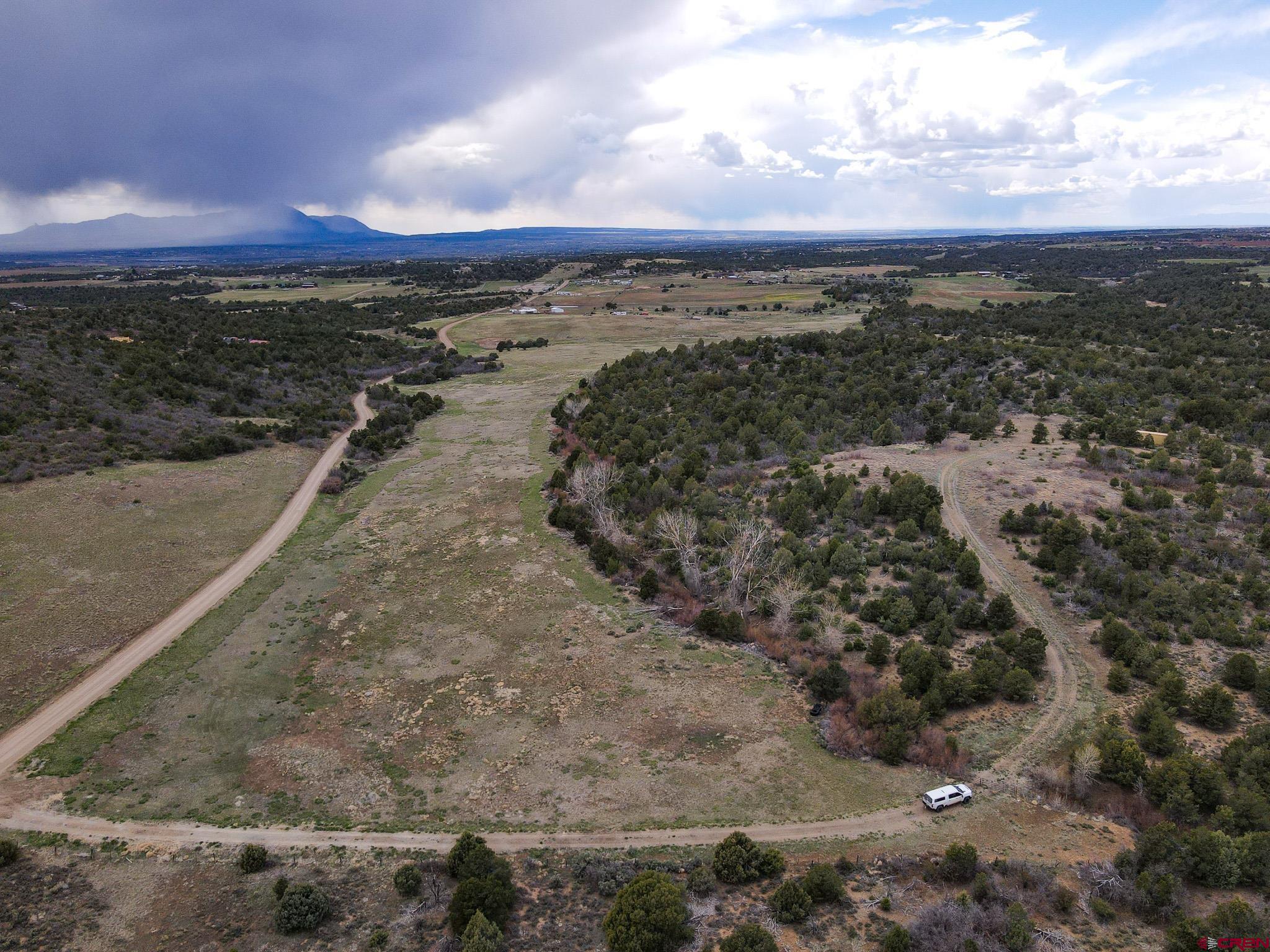 34495 Rd P.2 Mancos, CO 81328 - Photo 4 of 42 a view of a city with sunset view