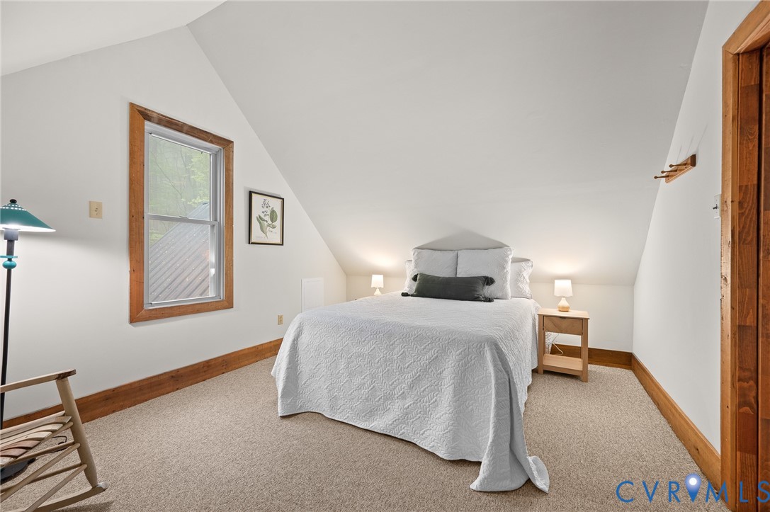 270 Little Cabin Road Amherst, VA 24521 - Photo 24 of 52 a bedroom with a bed and a painting on the wall
