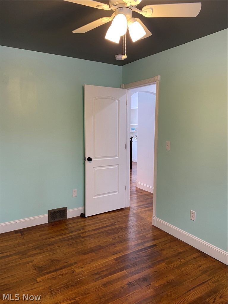 4115 South Ridge Road East Ashtabula, OH 44004 - Photo 22 of 35 Bedroom 2 - 12 x 8 with hardwood flooring and ceiling fan.