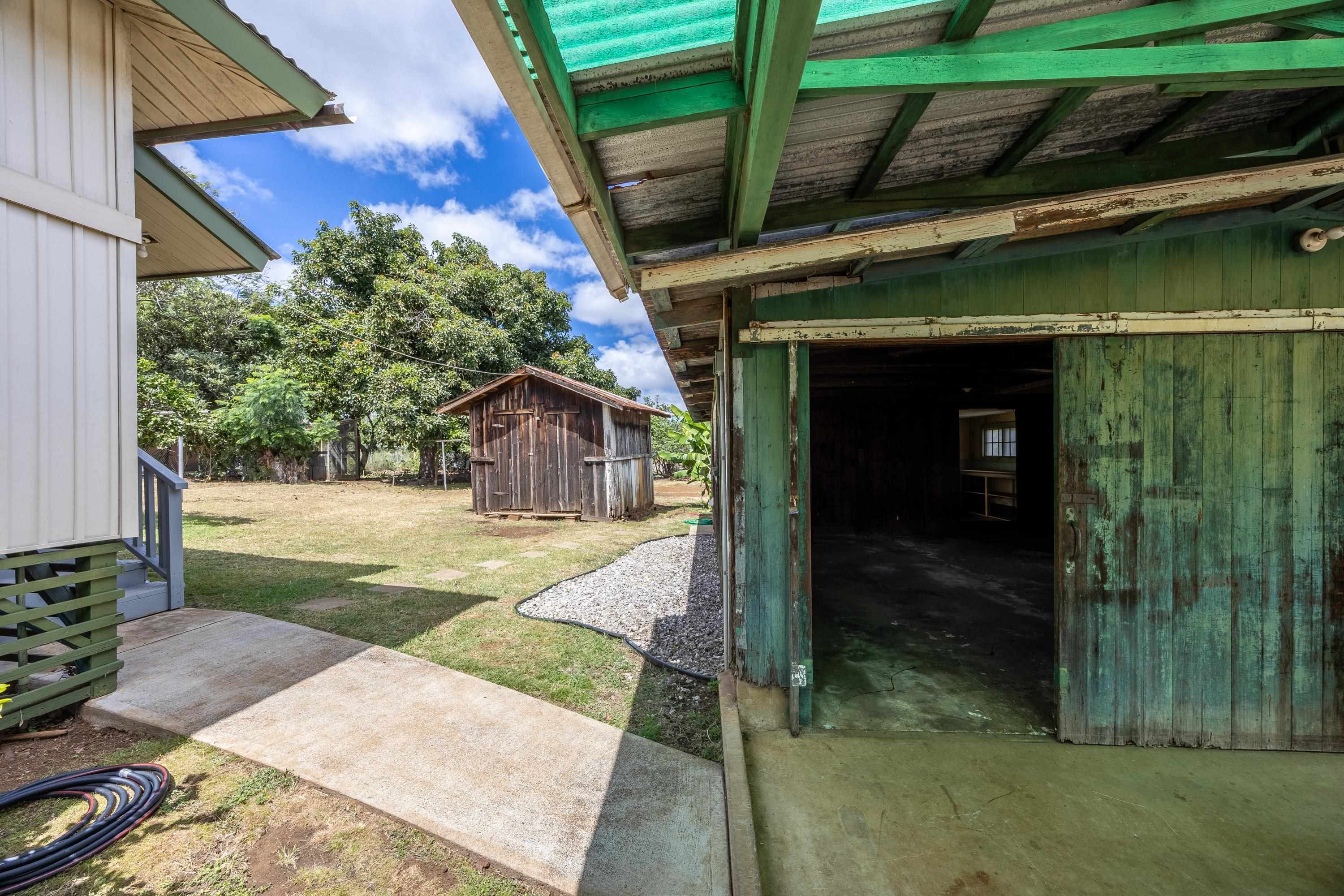 3044 Lower Kula Road Kula, HI 96790 - Photo 18 of 44 a view of a house with a yard