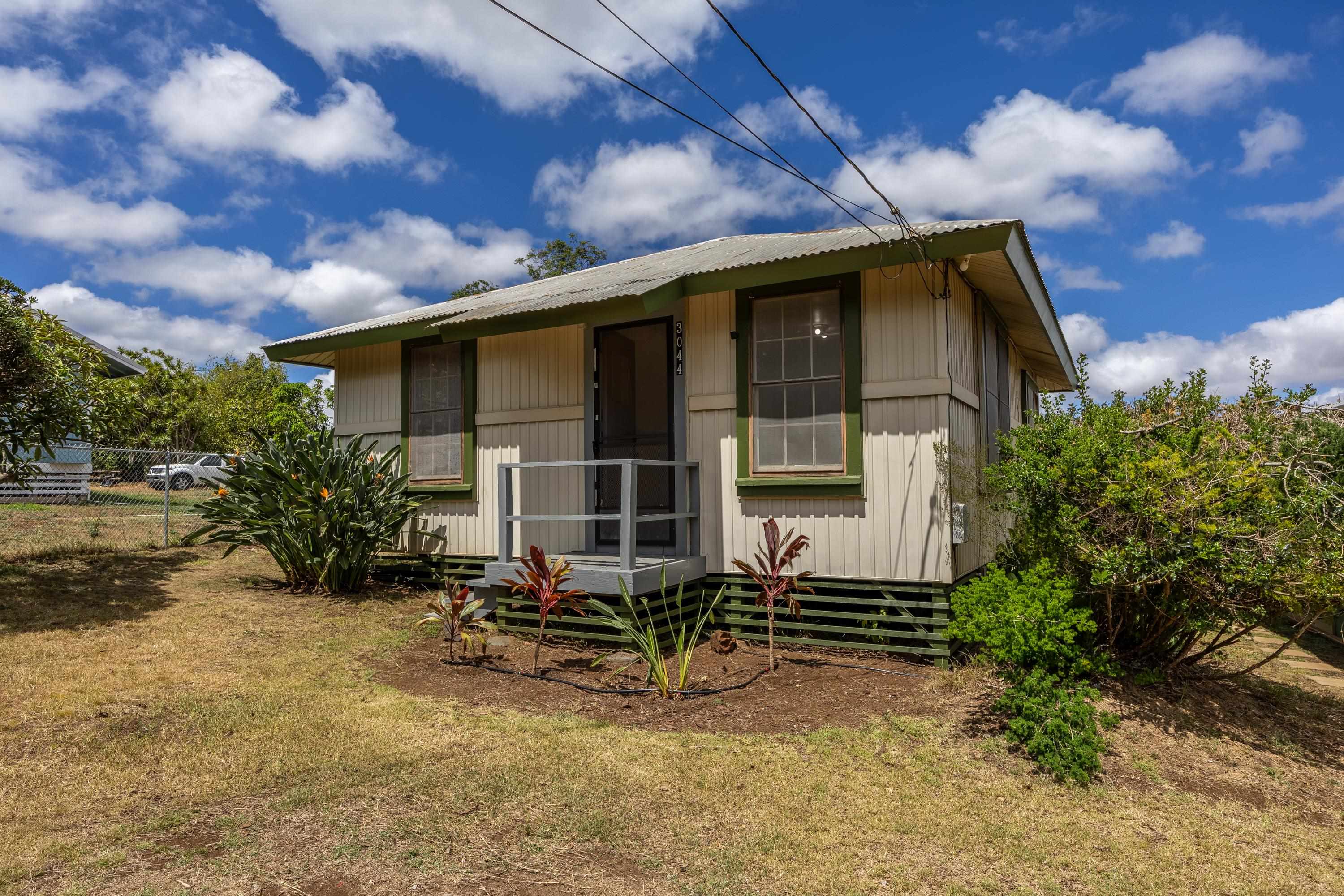 3044 Lower Kula Road Kula, HI 96790 - Photo 19 of 44 a view of house with backyard outdoor seating and hardwood