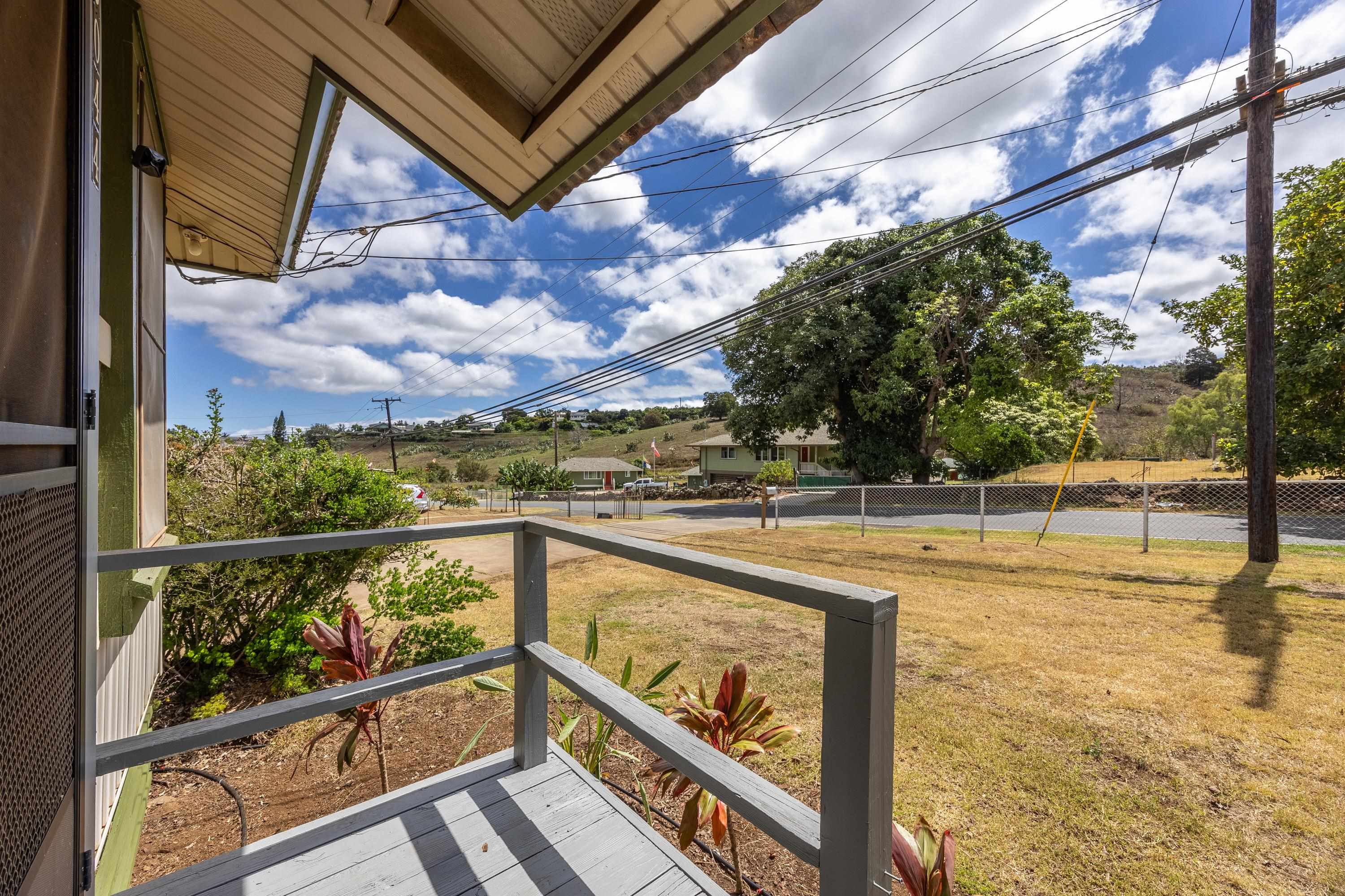 3044 Lower Kula Road Kula, HI 96790 - Photo 20 of 44 a view of a swimming pool with a porch