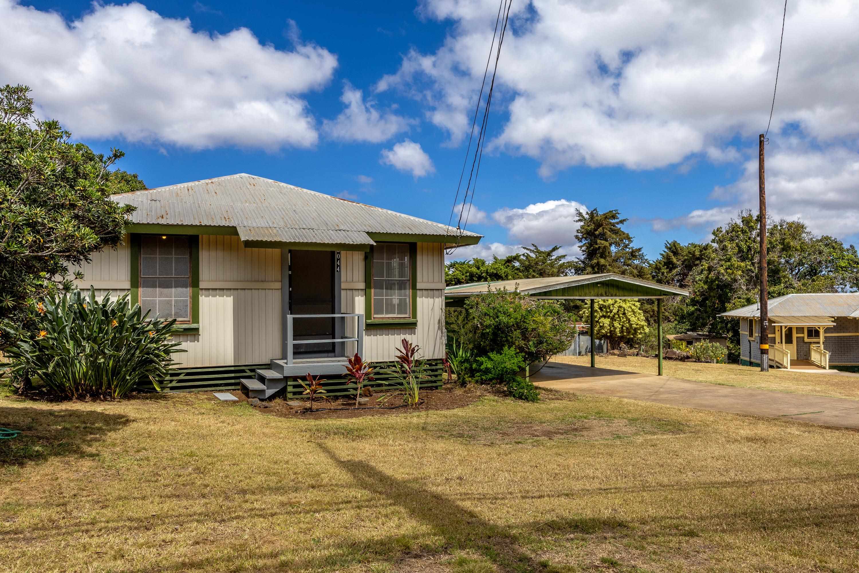 3044 Lower Kula Road Kula, HI 96790 - Photo 2 of 44 a front view of a house with a yard