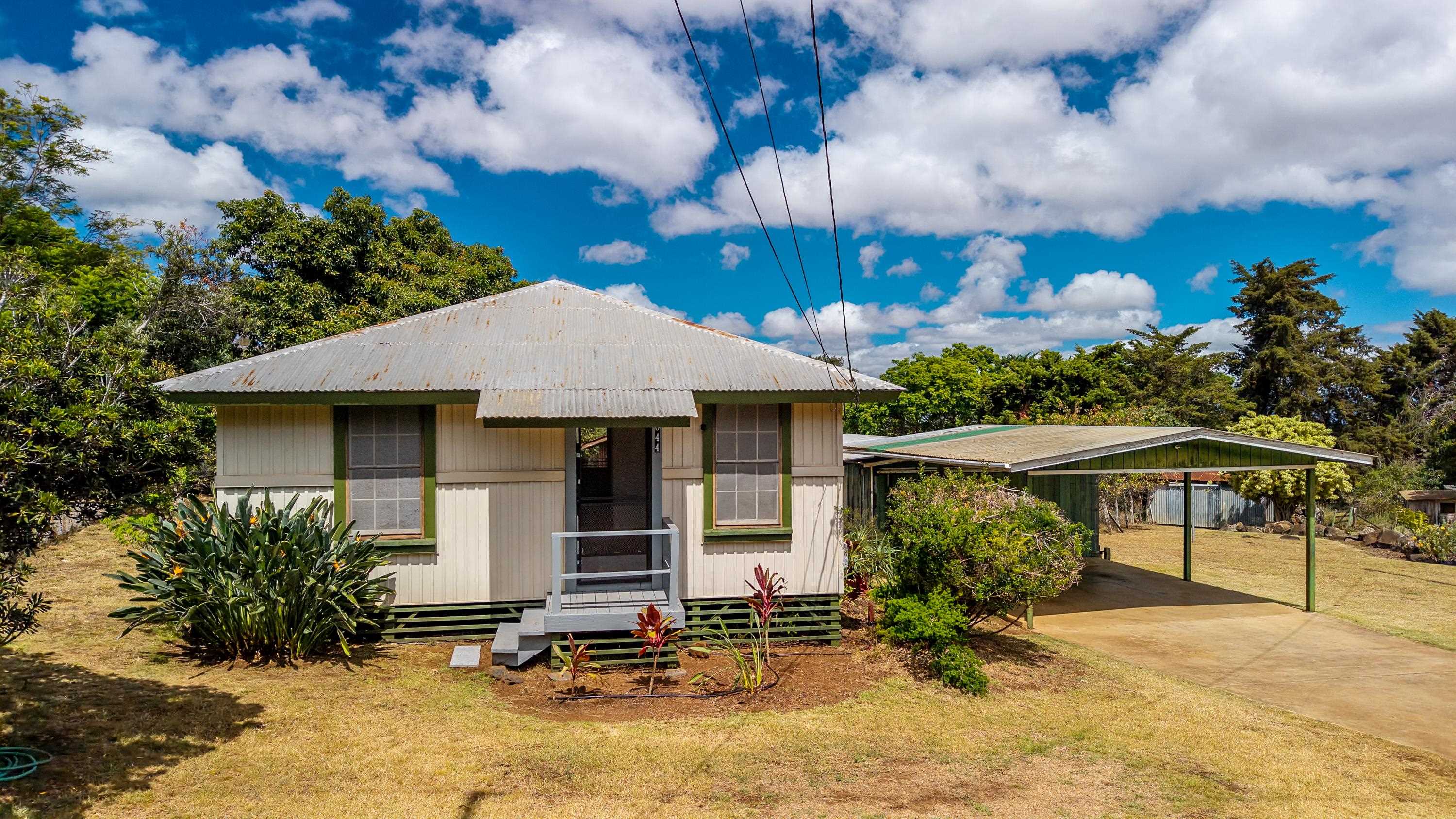 3044 Lower Kula Road Kula, HI 96790 - Photo 42 of 44 a front view of a house with garden