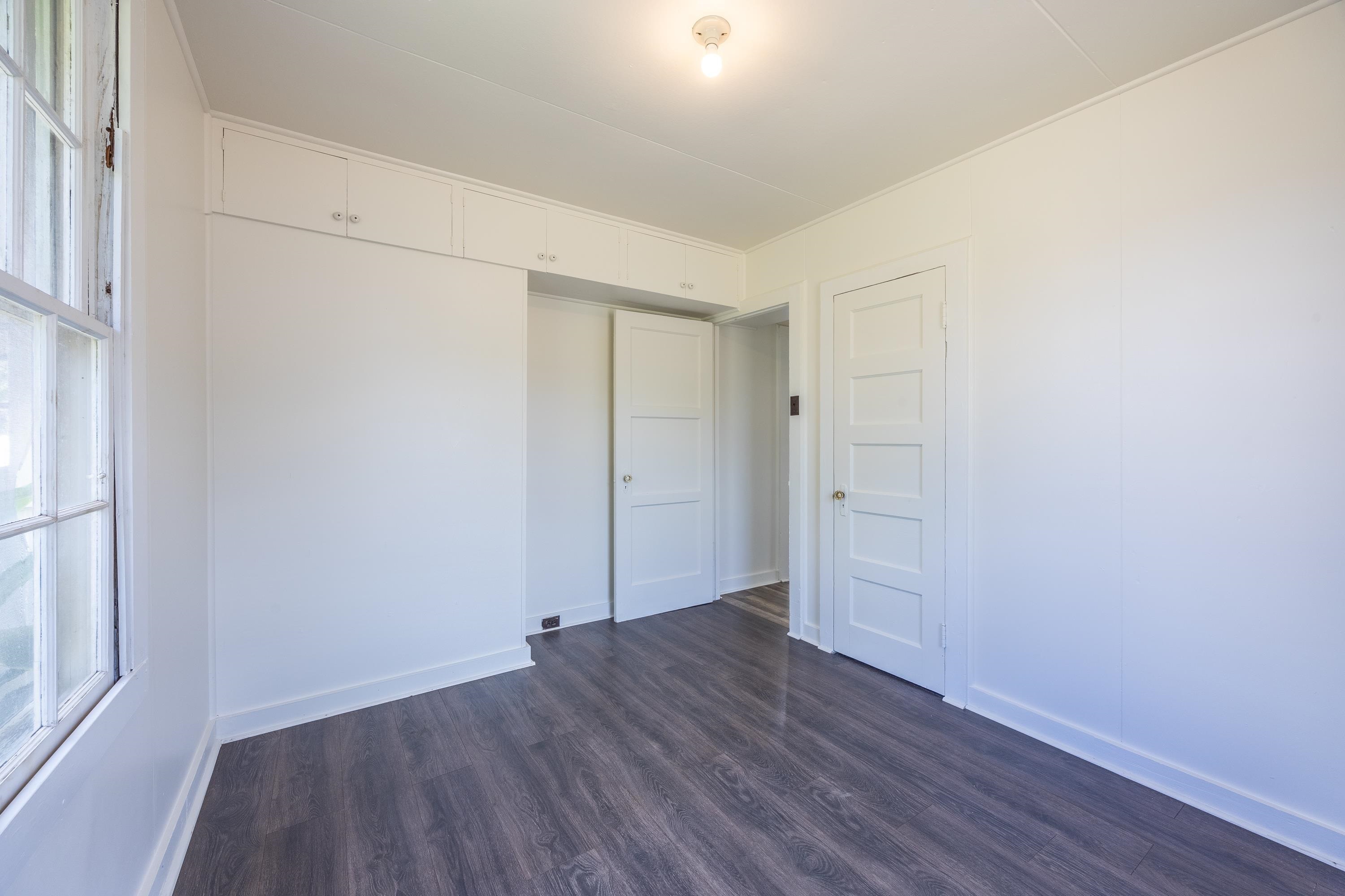 3044 Lower Kula Road Kula, HI 96790 - Photo 9 of 44 a view of an empty room with wooden floor