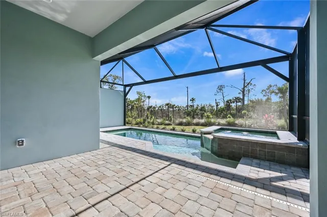 a view of swimming pool outdoor seating