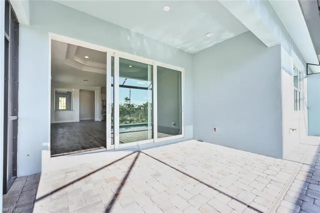 a view of a garden with a building