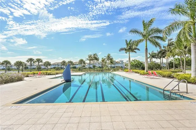 a view of a backyard with a sitting area