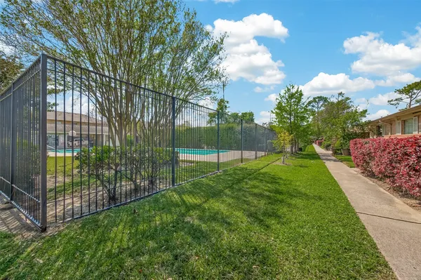 a view of a backyard with a garden
