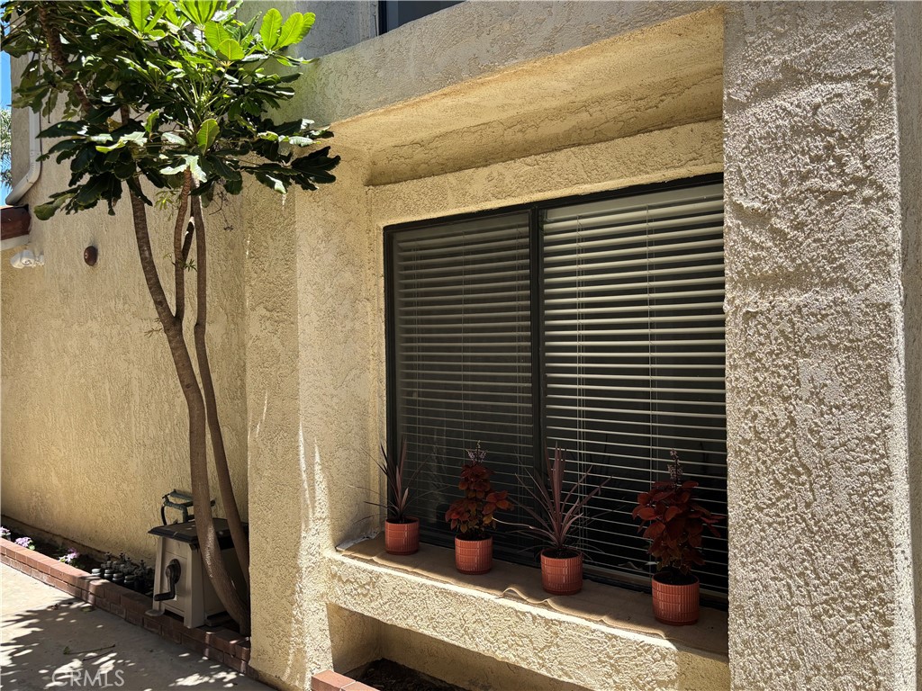 3014 Enrique, Unit 98 San Clemente, CA 92673 - Photo 13 of 14 a view of entryway with a flower pot