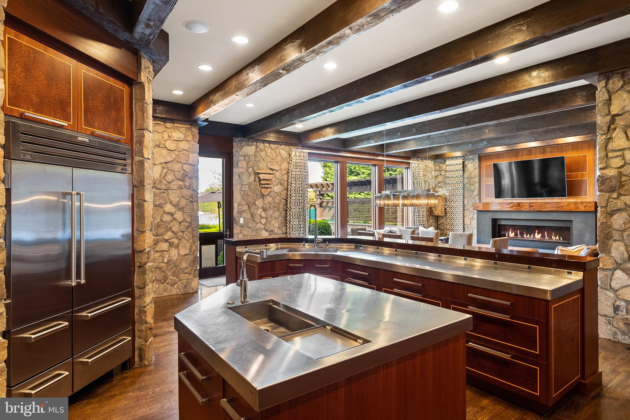 806 Coachway Annapolis, MD 21401 - Photo 14 of 43 a kitchen with stainless steel appliances granite countertop a sink a stove and a refrigerator