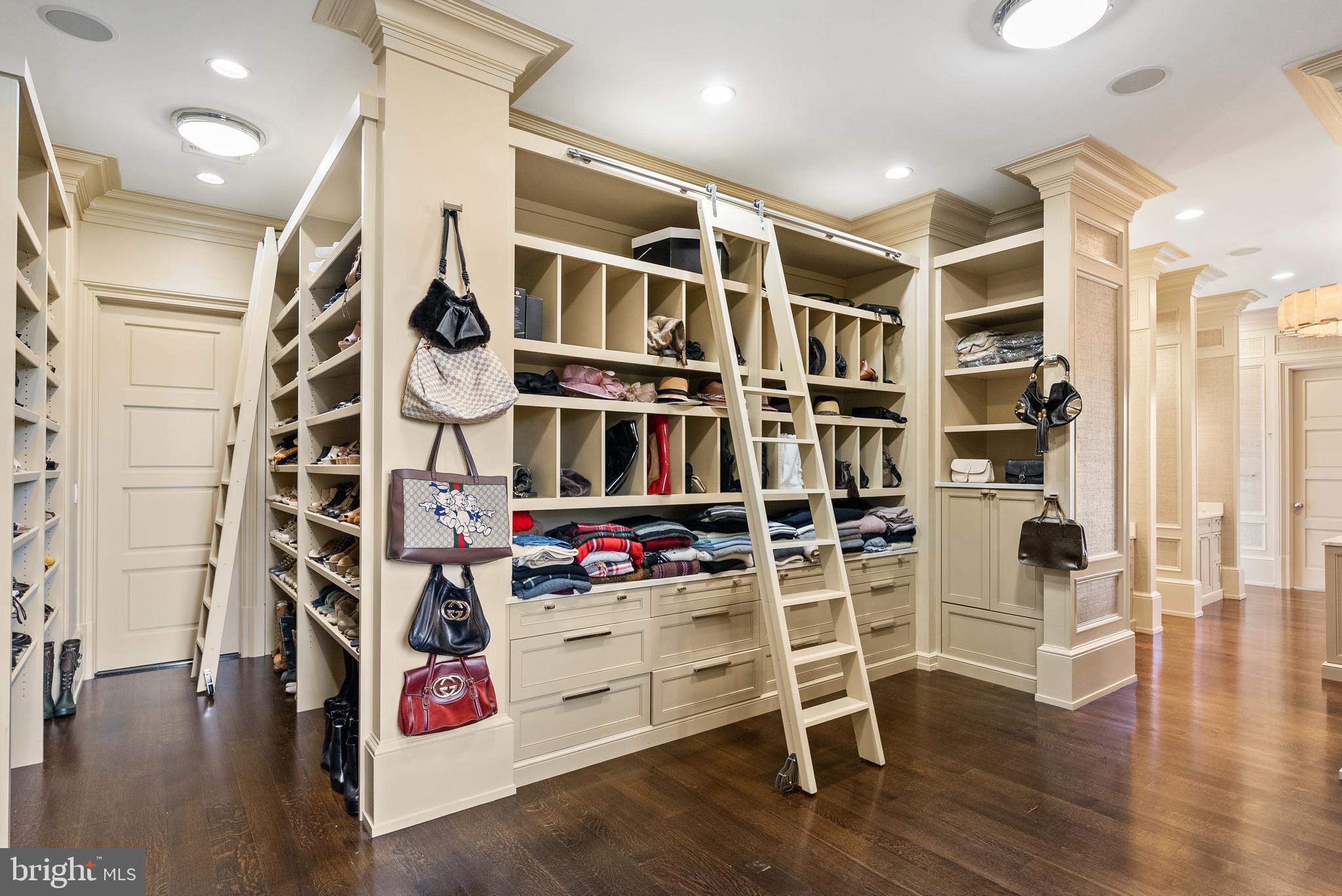 806 Coachway Annapolis, MD 21401 - Photo 27 of 43 a view of walk in closet with clothes and shoes