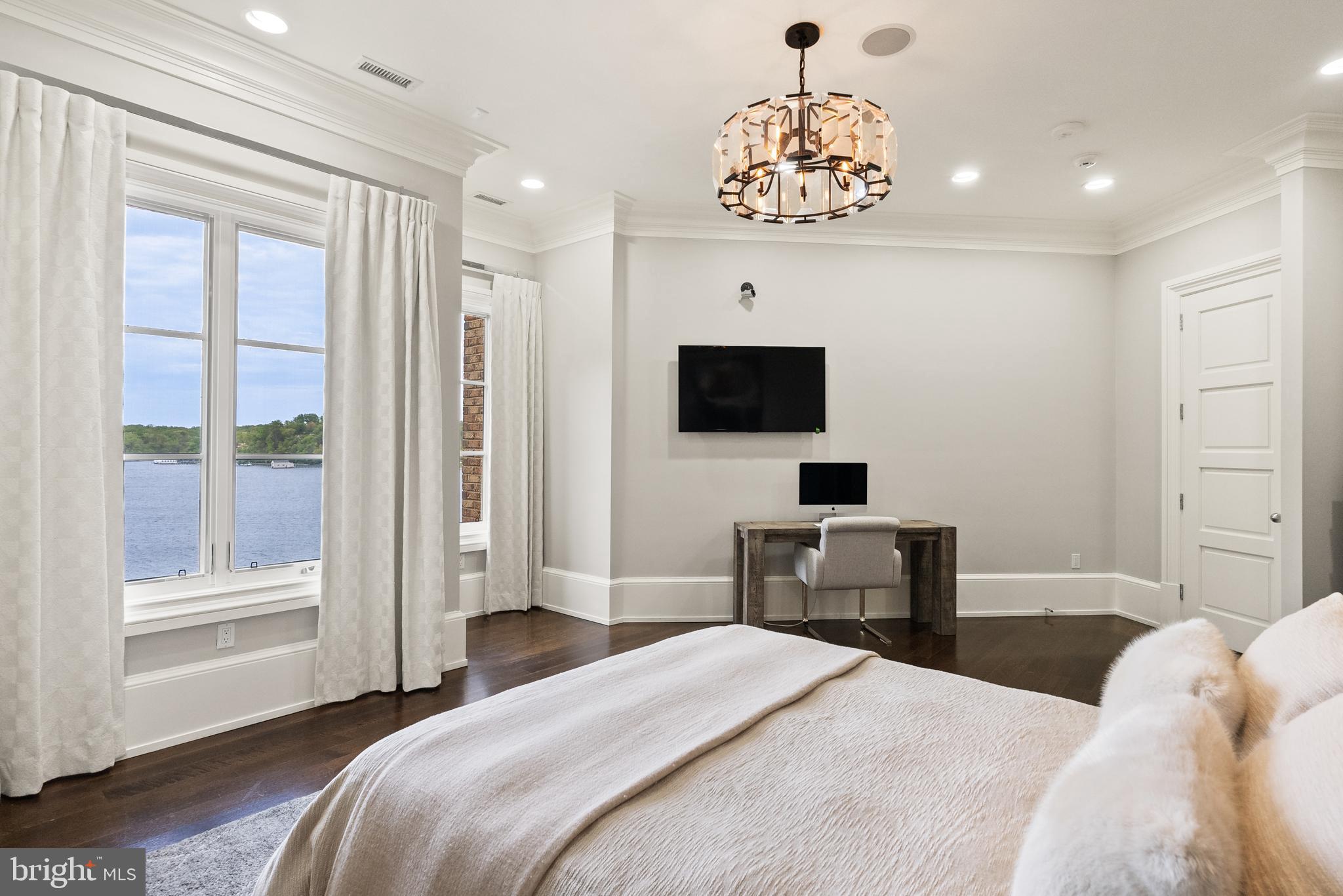 806 Coachway Annapolis, MD 21401 - Photo 30 of 43 a bedroom with a bed and a flat screen tv