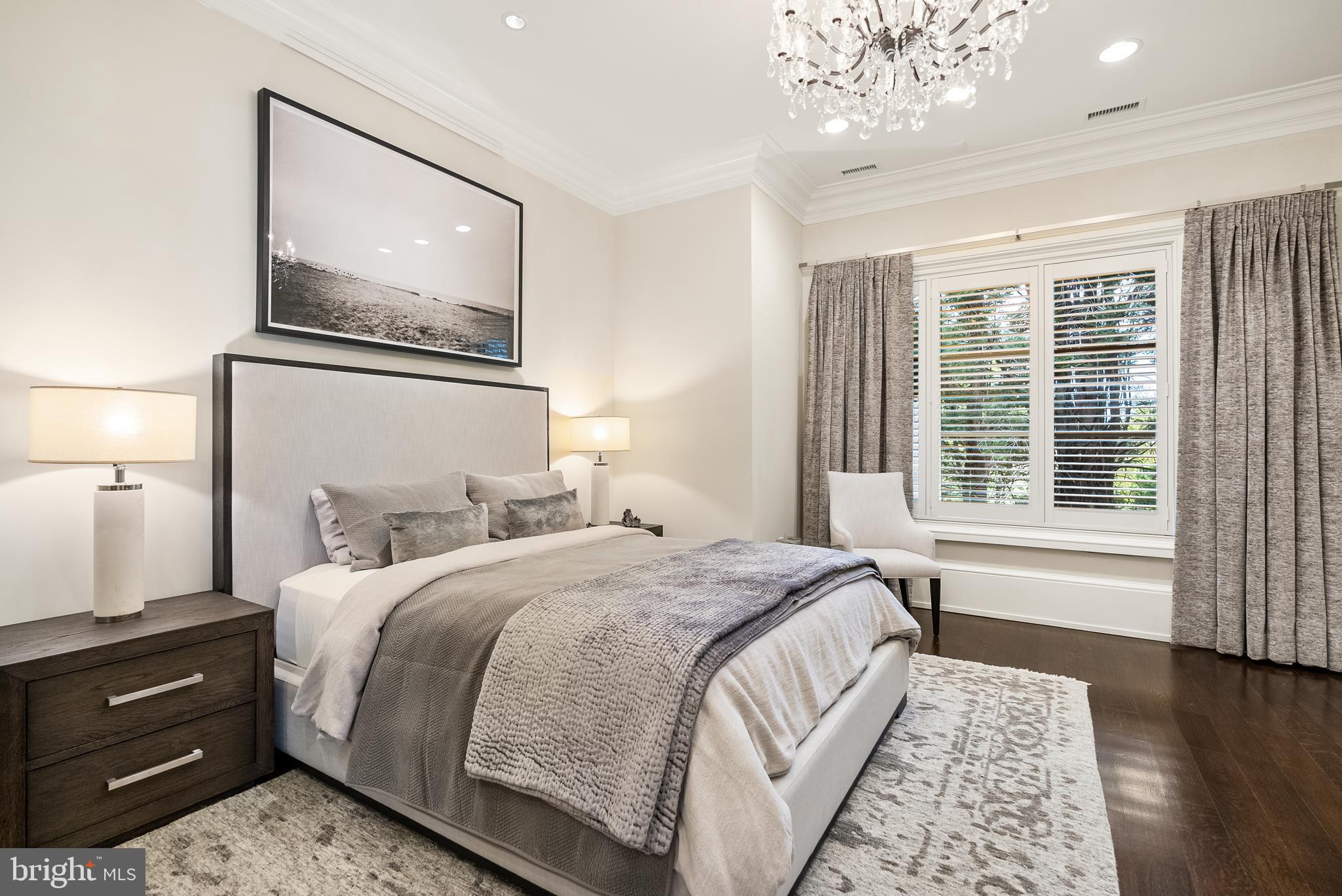 806 Coachway Annapolis, MD 21401 - Photo 31 of 43 a bedroom with a bed and wooden floor