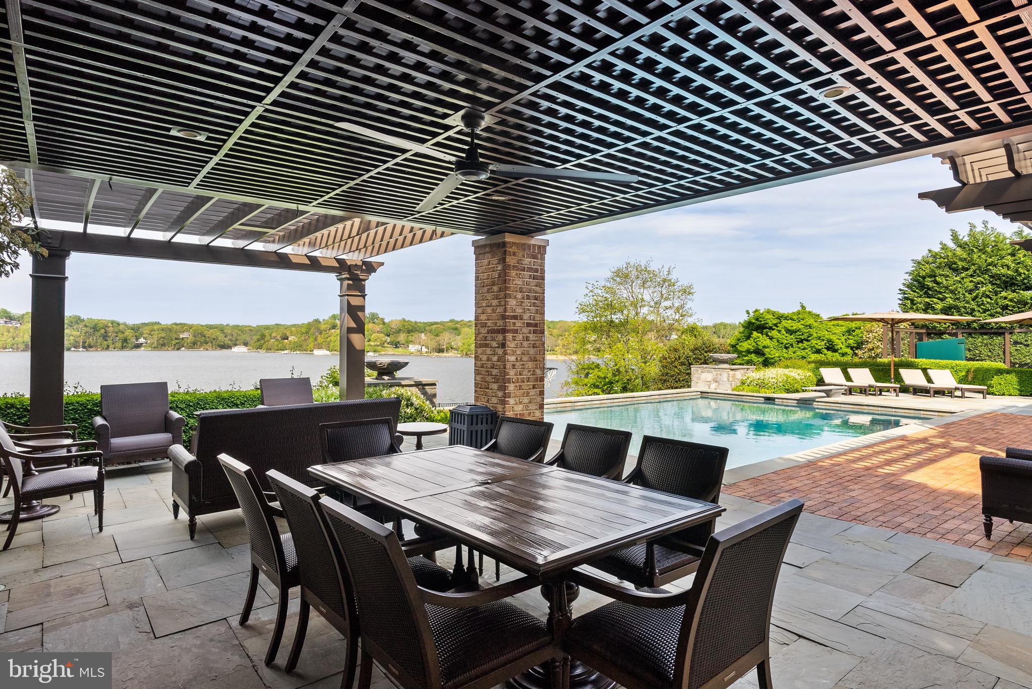 806 Coachway Annapolis, MD 21401 - Photo 9 of 43 a roof deck with a table and chairs