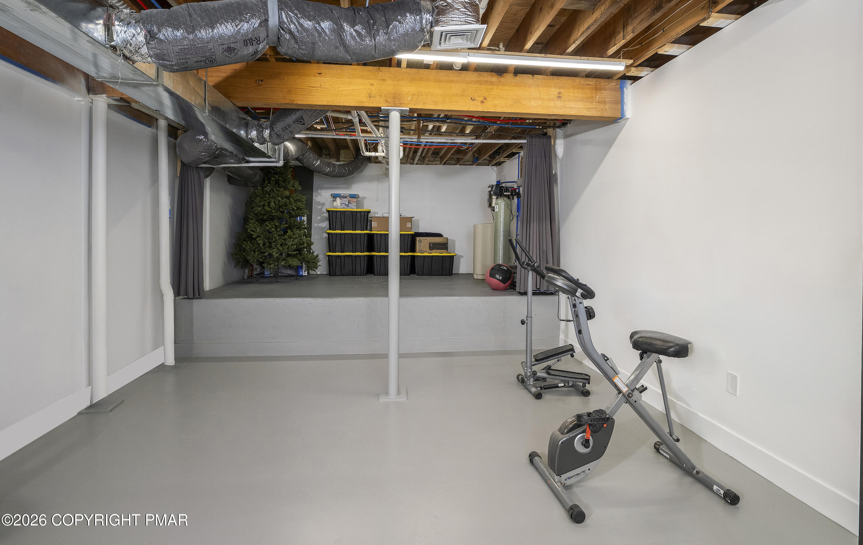 1117 Red Fox Road East Stroudsburg, PA 18301 - Photo 48 of 61 049_Basement Gym and Storage Angle 2