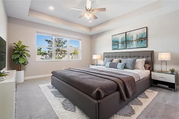 a bedroom with bed and a window