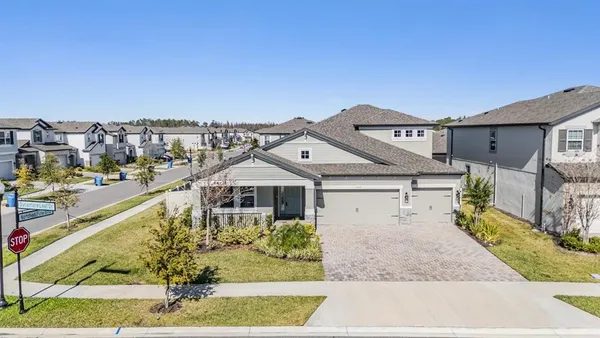 a view of a house with a ocean view