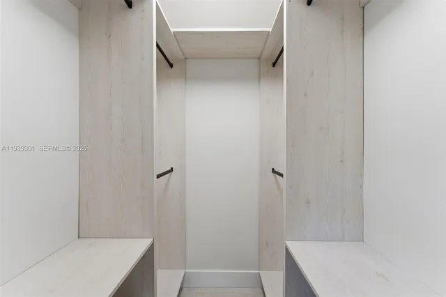 a bathroom with a sink and shower