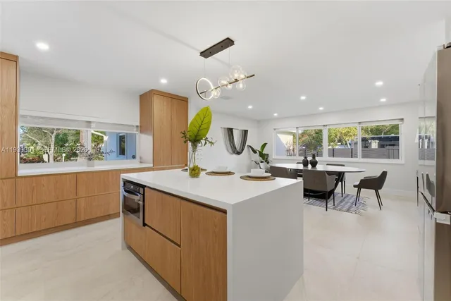 a kitchen with a sink and counter top space