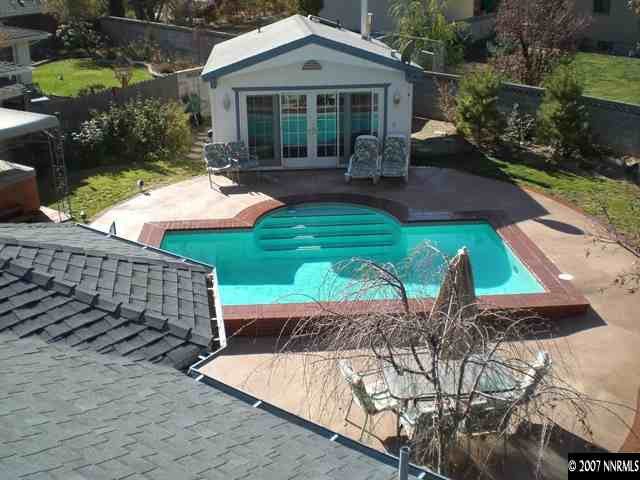 2245 Lindley Way Reno, NV 89509 - Photo 3 of 9 a front view of a house with garden