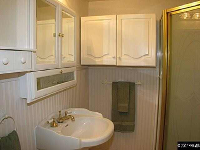 2245 Lindley Way Reno, NV 89509 - Photo 8 of 9 a bathroom with a sink and a window