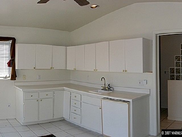 2245 Lindley Way Reno, NV 89509 - Photo 9 of 9 a kitchen with white cabinets