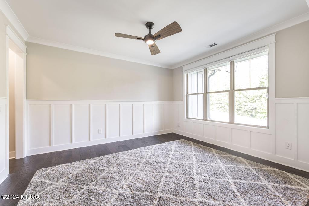 411 Crescent Drive Forsyth, GA 31029 - Photo 13 of 57 a view of an empty room with a window